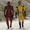 Deadpool (left) and Wolverine (right) standing side by side in uniform.